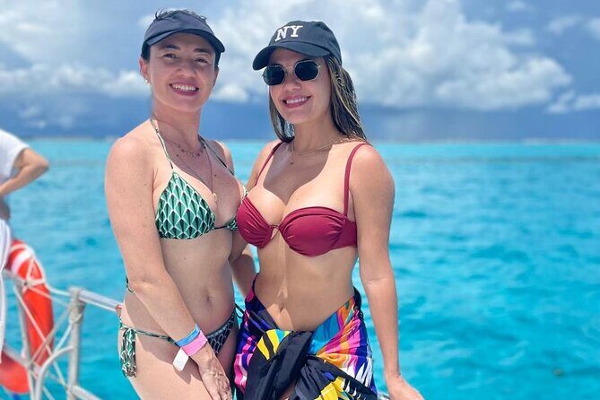 Best Catamaran Isla Mujeres tour with Open bar, lunch, snorkel - What Sets This Tour Apart: Value and Authenticity