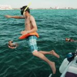 Cancun: Isla Mujeres Adults Only Party Catamaran with Drinks - Breaking Down the Itinerary