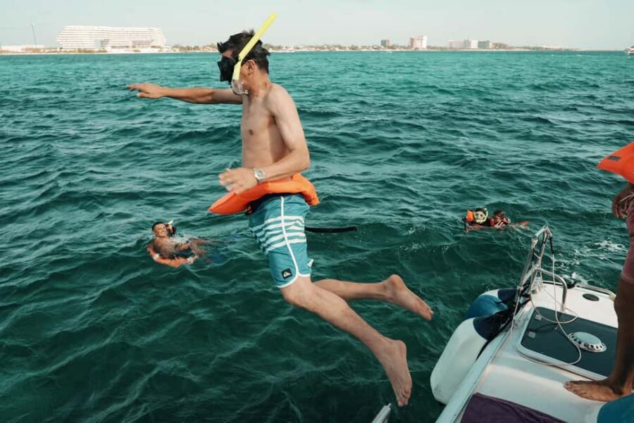 Cancun: Isla Mujeres Adults Only Party Catamaran with Drinks - Breaking Down the Itinerary