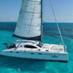 Cancun: Isla Mujeres Catamaran + Coco Bongo Show - Isla Mujeres: Beach, Town, and Free Time