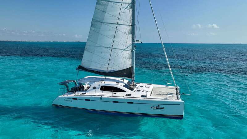 Cancun: Isla Mujeres Catamaran + Coco Bongo Show - Isla Mujeres: Beach, Town, and Free Time