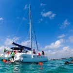 Cancun Sailing Catamaran Islas Mujeres With Luxury Beach Club - Cost, Inclusions, and Extra Fees