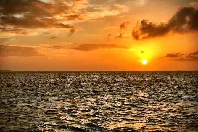 Catamaran to Isla Mujeres at sunset pick up Cancun - Authentic Traveler Perspectives