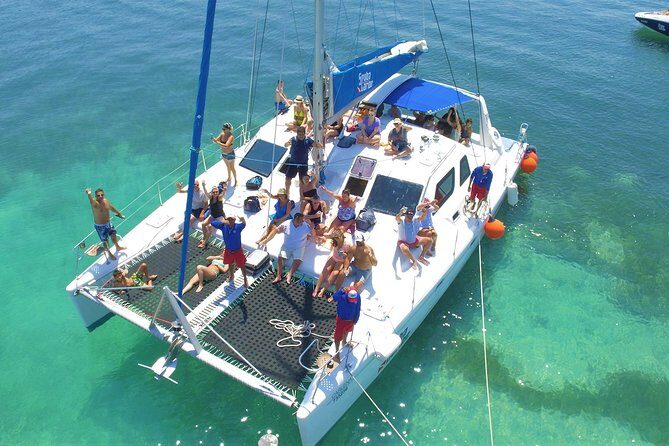 Discover Isla Mujeres in Catamaran. Buffet, Open Bar and Snorkel - Exploring Isla Mujeres: From Beach to Bazaar