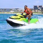 Drive a Waverunner in the beautiful Maroma Beach with transport - The Sum Up