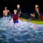 Giant Glow Paddleboarding the Downtown Skyline with Bats - The Sum Up