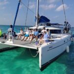 Isla Mujeres: Catamaran Tour with Snorkeling Food, Drinks, Beach - Authentic Experiences and Practical Details