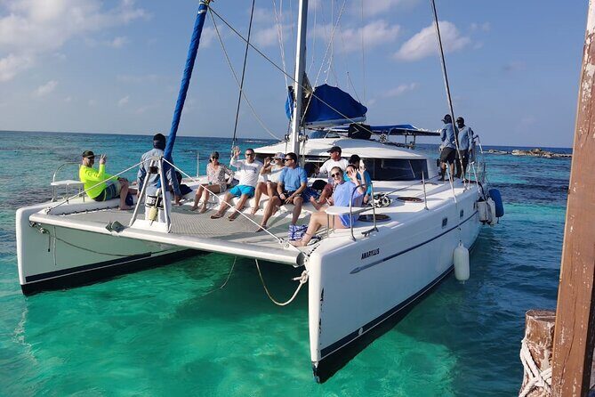 Isla Mujeres: Catamaran Tour with Snorkeling Food, Drinks, Beach - Authentic Experiences and Practical Details