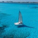 Isla Mujeres Day Tour with Catamaran, Snorkeling & Beach Club - Practical Details and Value