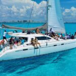 Isla Mujeres Spring Break Party Catamaran Snorkel and Open Bar - The Party Vibe: Open Bar and Beach Club Fun