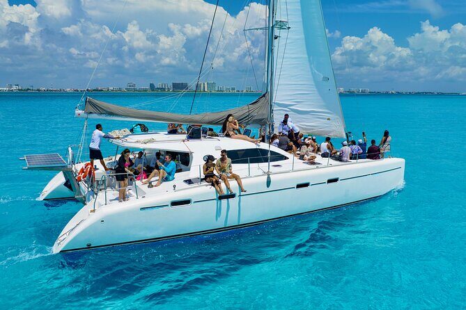 Isla Mujeres Spring Break Party Catamaran Snorkel and Open Bar - The Party Vibe: Open Bar and Beach Club Fun