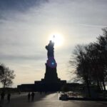 New York, discover the Statue of Liberty and Ellis Island. - Real Traveler Insights