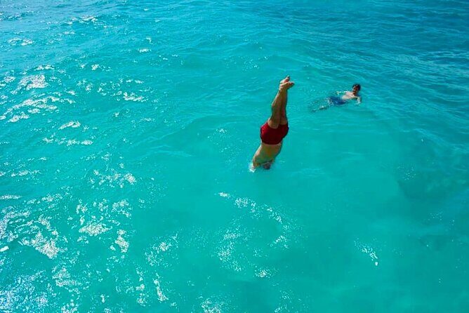 Party at Sea Private Catamaran Tour with Music and Drinks - The Cruise: Sailing to Isla Mujeres