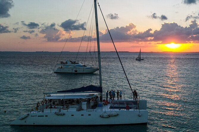 Private Isla Mujeres Sailing Catamaran Tour with Transportation - Authentic Experiences & Review Highlights