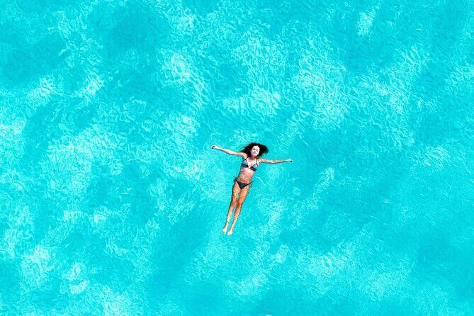 Tour Catamaran Sailing from Cancun to Isla Mujeres - With Open Bar - The Experience: Authentic, Relaxed, and Fun