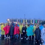 Watch a Football Match at the Stadium - The Transport and Group Size