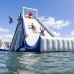 50 Minutes, Southport GC Aqua Park Inflatable Water Activity - The Experience: Climbing, Sliding, and Splashing